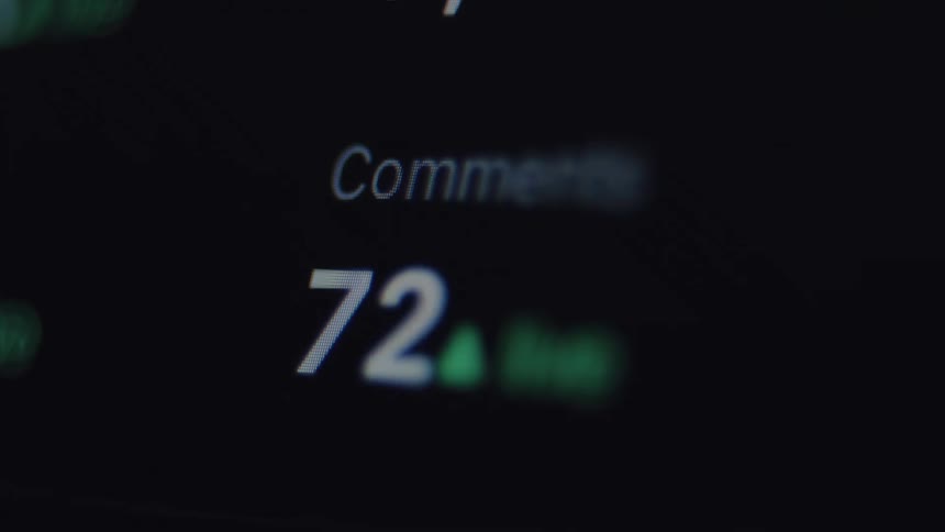 A close-up shot of a social media comment counter rapidly increasing, showing viral engagement