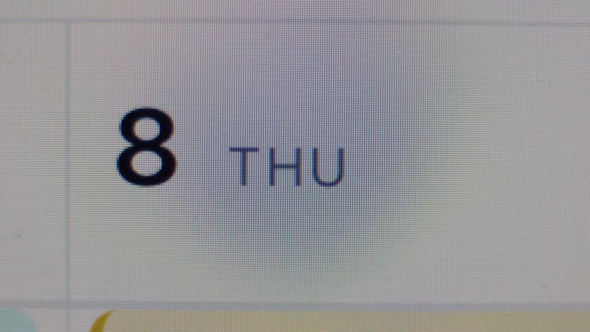 Close-up of digital calendar interface showing Thursday the 8th on a computer screen