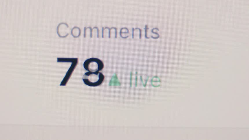 A close-up of a social media live comment counter rapidly increasing, indicating growing online engagement
