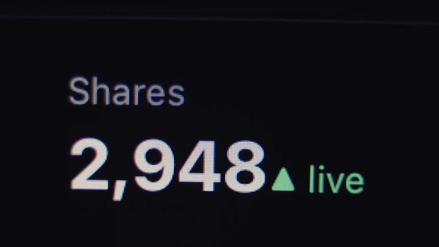 A close-up of a social media share counter rapidly increasing, showing a post going viral in real-time