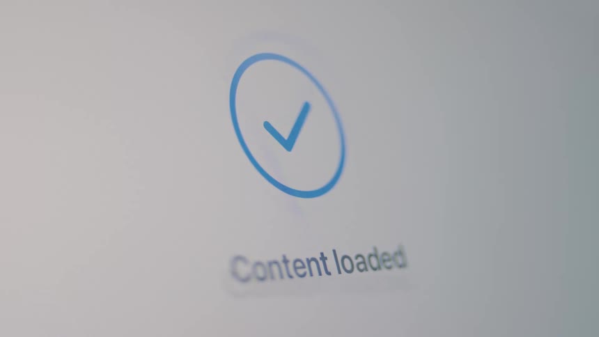 A blue circular loading icon animates on a digital screen, followed by the text 'Content loaded' and a final checkmark indicating success