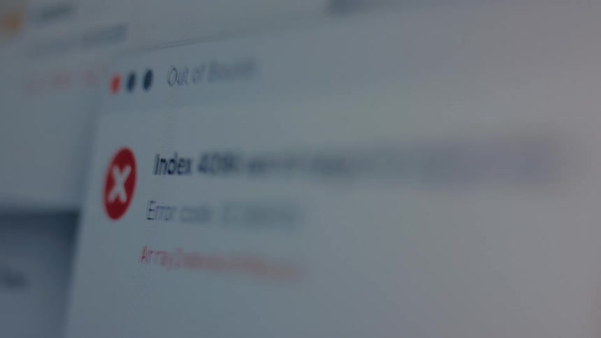 A close-up view of a computer screen being flooded with numerous cascading error messages, warnings, and system failure notifications