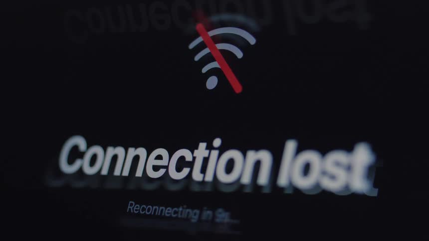 Close-up of a 'Connection lost' error message with a countdown timer on a glitching digital screen