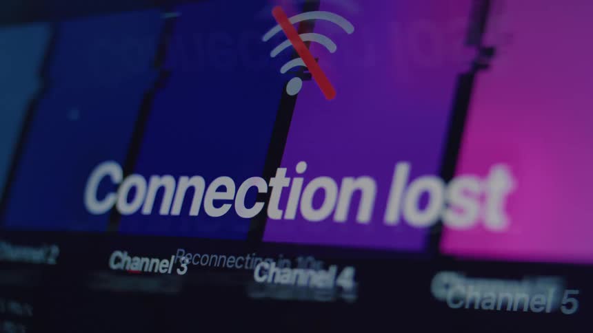 A digital screen displays a glitchy, colorful graphic before showing a 'Connection lost' error message with a reconnecting countdown