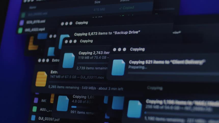 Digital chaos as a computer's operating system juggles dozens of simultaneous file copying and archive extraction tasks
