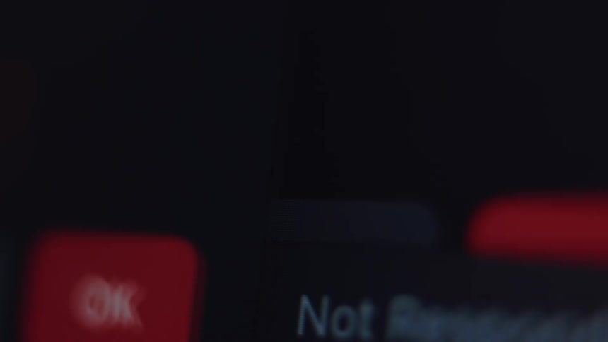 A chaotic montage of critical system errors, security alerts, and failure notifications flashing on a computer screen