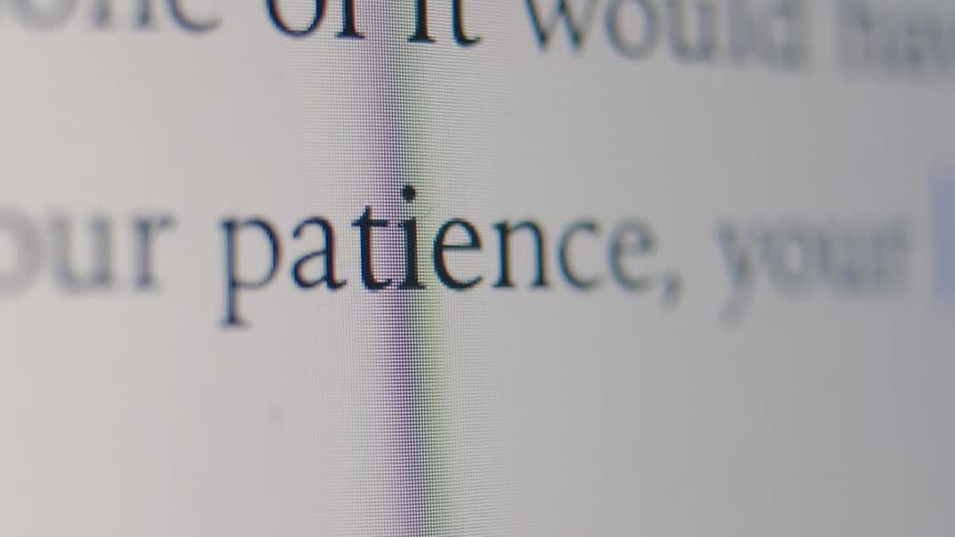 A macro shot shows the word 'patience' being typed on a computer screen, letter by letter