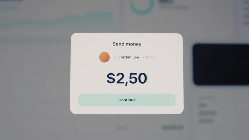 Close-up of a digital banking app interface showing a successful money transfer of $2,500