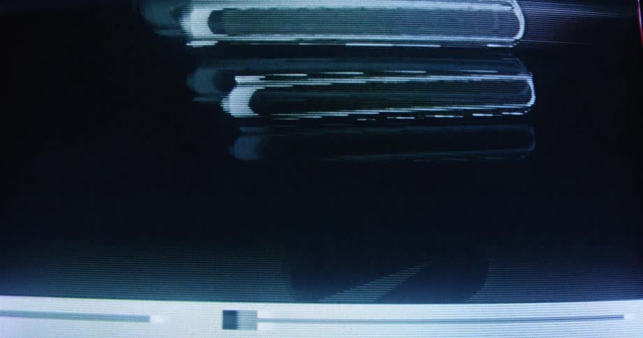 A distorted analog animation of abstract shapes glitches and warps on an old television screen