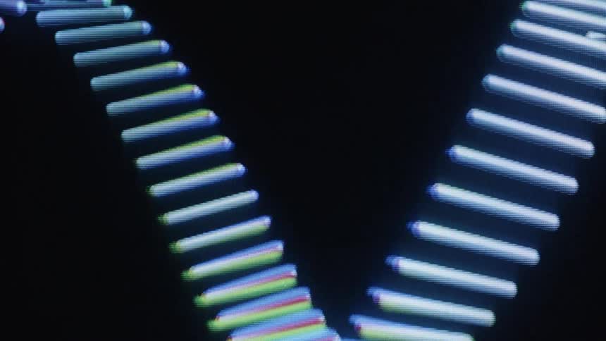 A mesmerizing close-up of a glowing, pixelated sine wave animation with a retro chromatic aberration effect on a black background