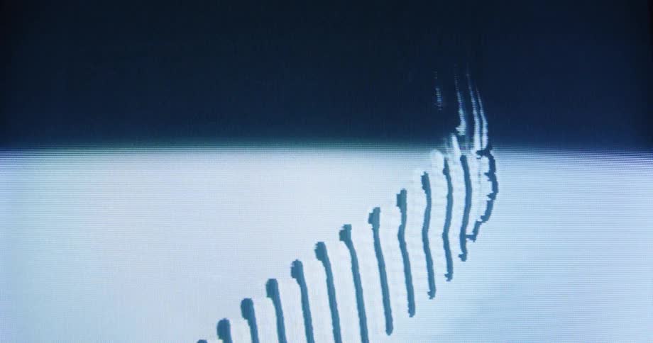 A glitchy, distorted blue and white abstract spiral animates on a flickering CRT monitor