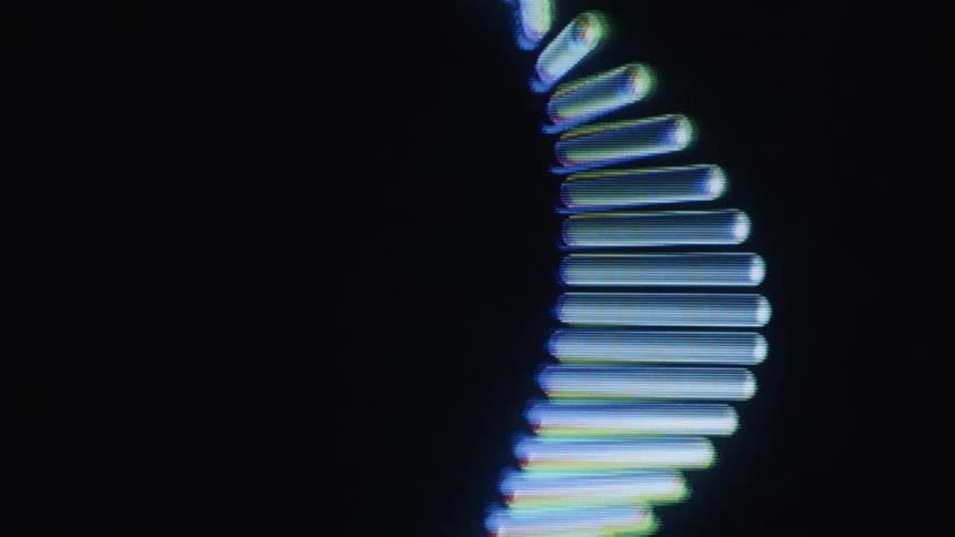 A stylized, digital animation of a DNA helix slowly rotates on a pixelated screen