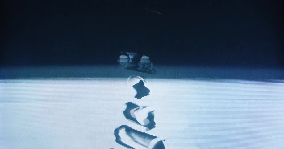 Glitch art effect with analog video noise and signal distortion on a CRT monitor