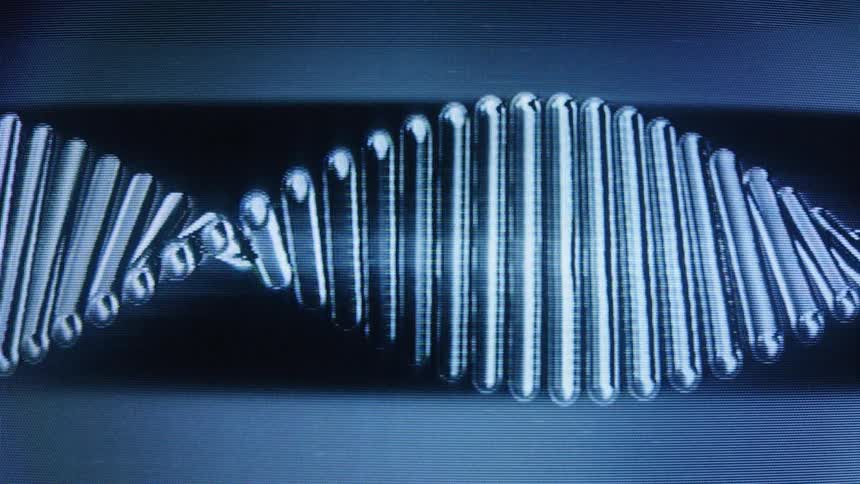 A close-up, stylized animation of a transparent DNA double helix rotating on a dark background