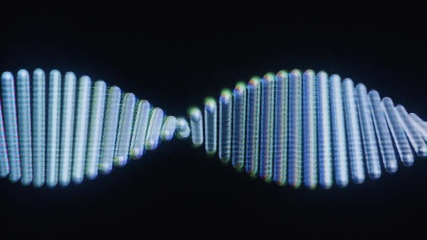 A computer-generated animation of a DNA double helix molecule slowly rotates on a digital display against a black background