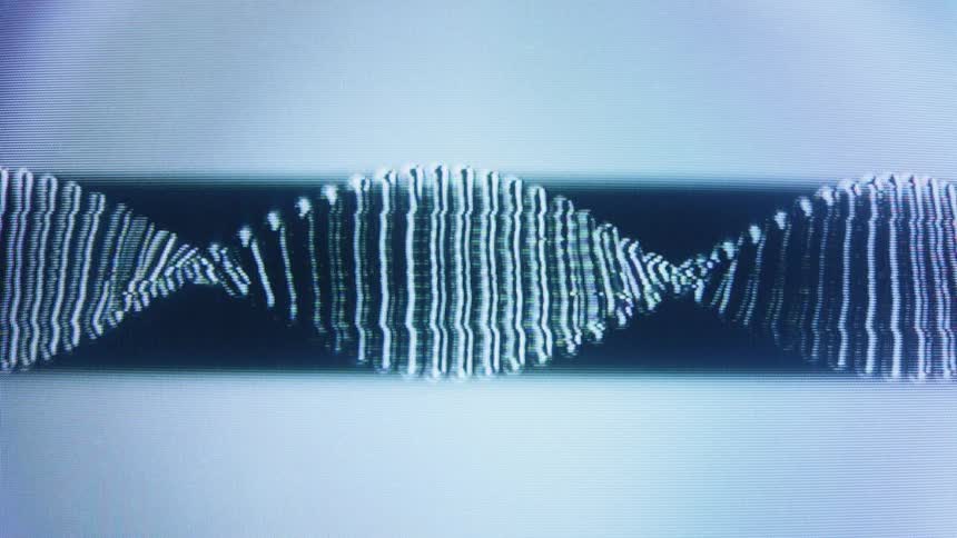 An abstract, animated representation of a DNA double helix slowly rotates with a distorted, glitchy television static effect