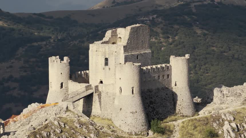 Time-lapse of moving shadows over the ancient Rocca Calascio castle ruins perched atop a mountain in Abruzzo, Italy