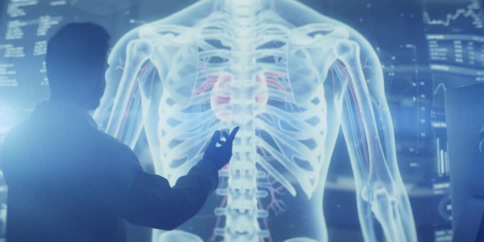 A doctor examines a glowing 3D hologram of the human anatomy, manipulating the skeletal and cardiovascular systems on a futuristic interface
