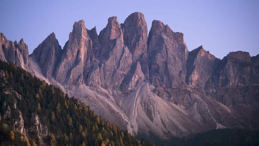 A stunning day-to-night timelapse of the rugged peaks of the Odle mountain range in the Dolomites, Italy