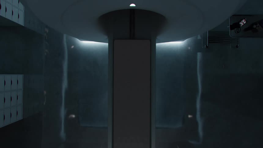 A slow dolly out shot reveals a sterile and futuristic room with a padded gurney in the center