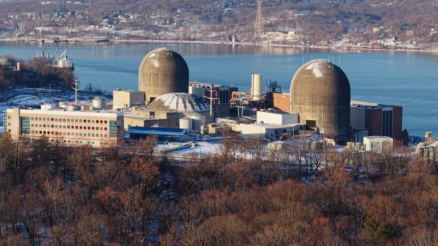 Aerial view reveals the Indian Point nuclear power plant on the snowy banks of the Hudson River in winter