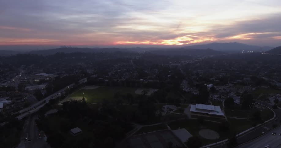 The town below is empty at dawn