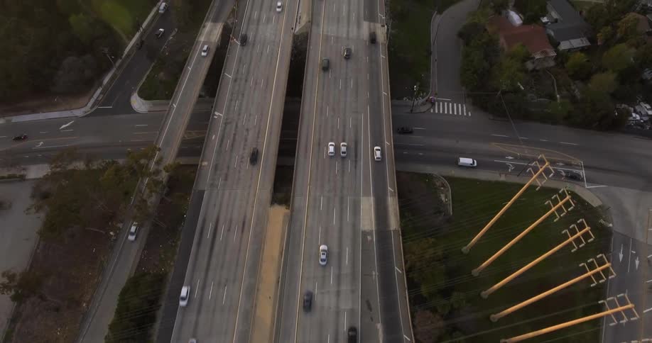 Cars drive on a city highway