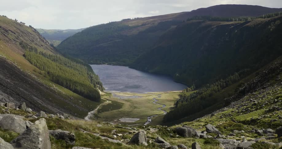 A river surrounded by large mountains