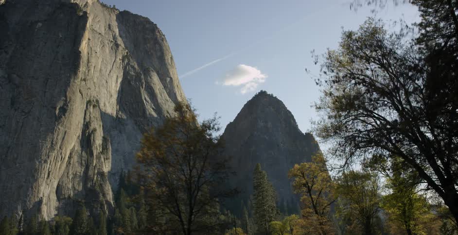 Stone mountains beyond the trees