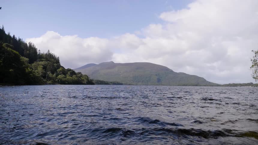 Water ripples and flows on a mountain lake