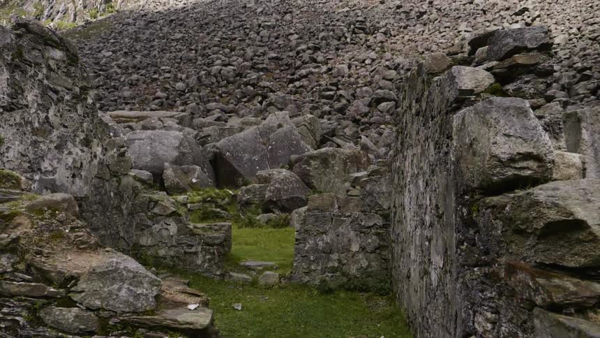 The site is full of broken walls and mounds of stone