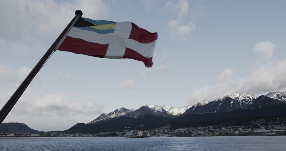 Bahamas merchant flag waves off ship as it departs port