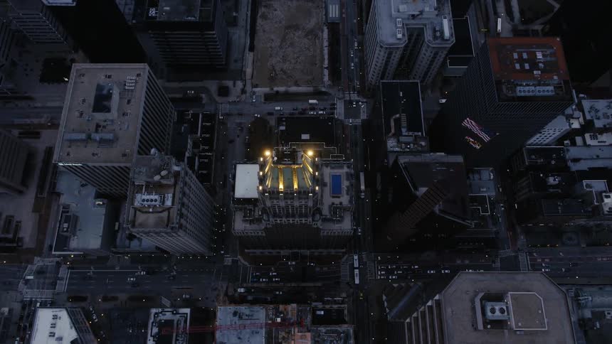 Aerial view of a large city at sunset