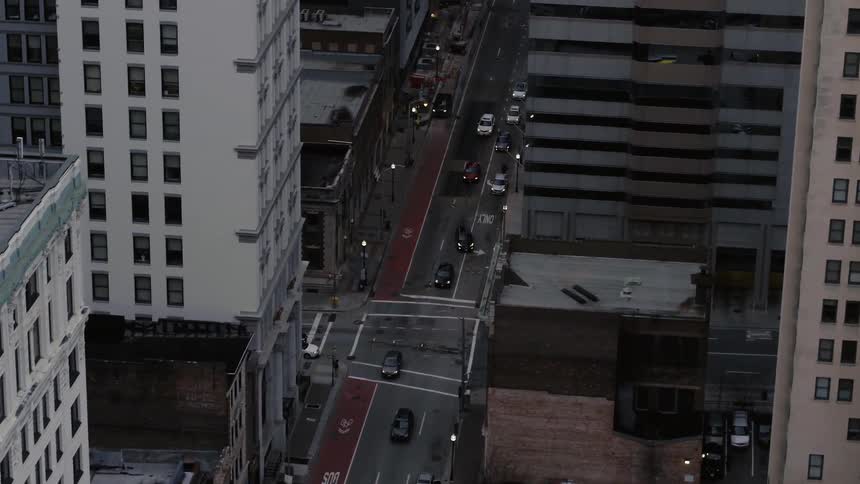 Aerial view of vehicles driving on a city street