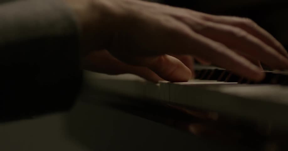A person is playing the piano