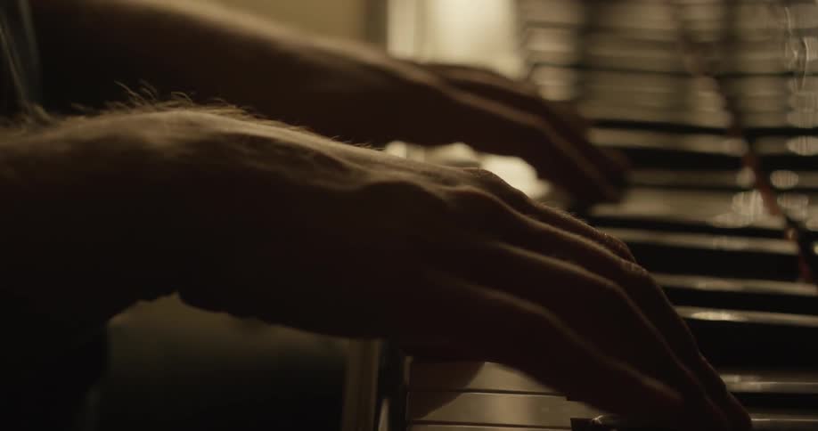 A man plays the piano