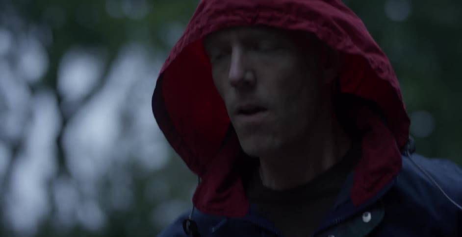 Man jogs through the woods