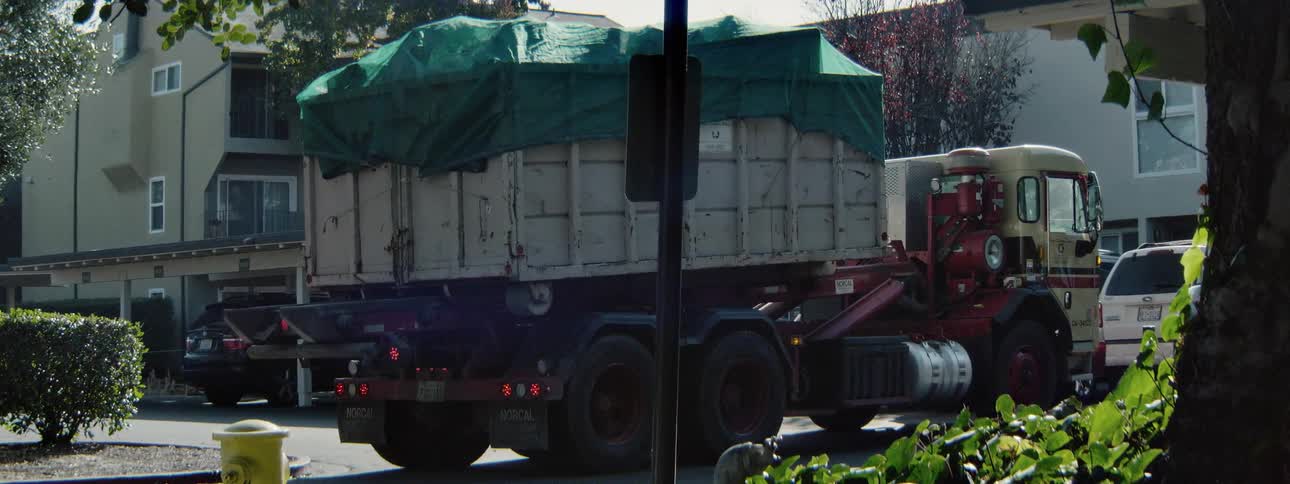 A container is loaded on a trailer