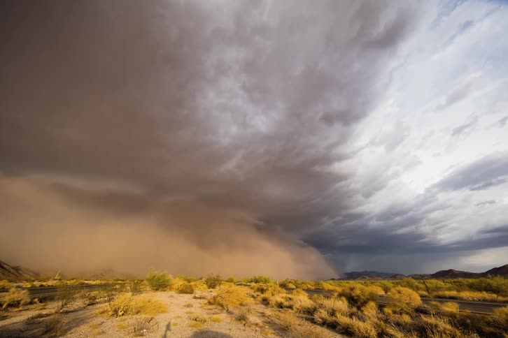 Rain clouds billowing over plains
