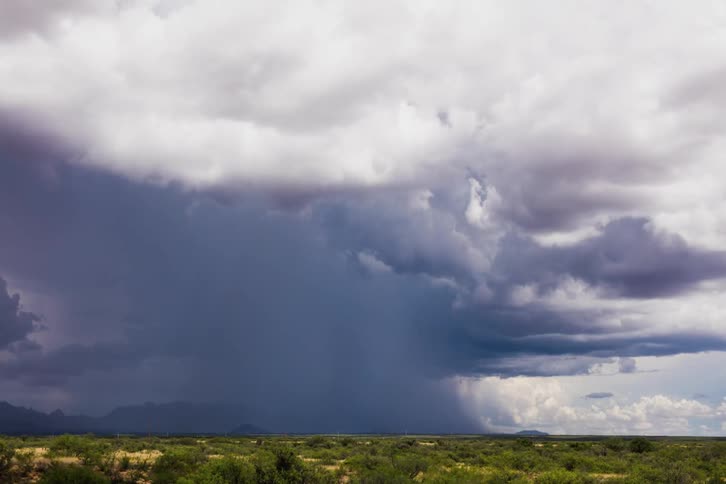 Rain clouds moving over plains