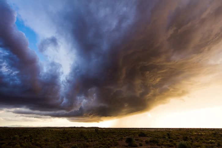 Clouds roll over flat plains