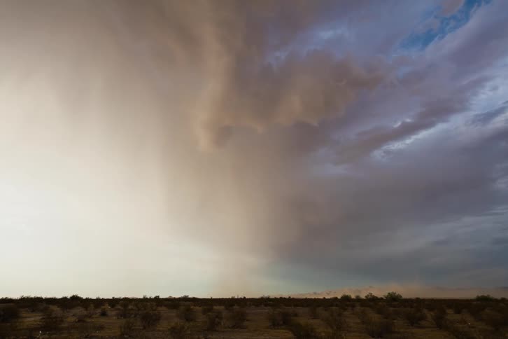 Clouds roll over flat plains