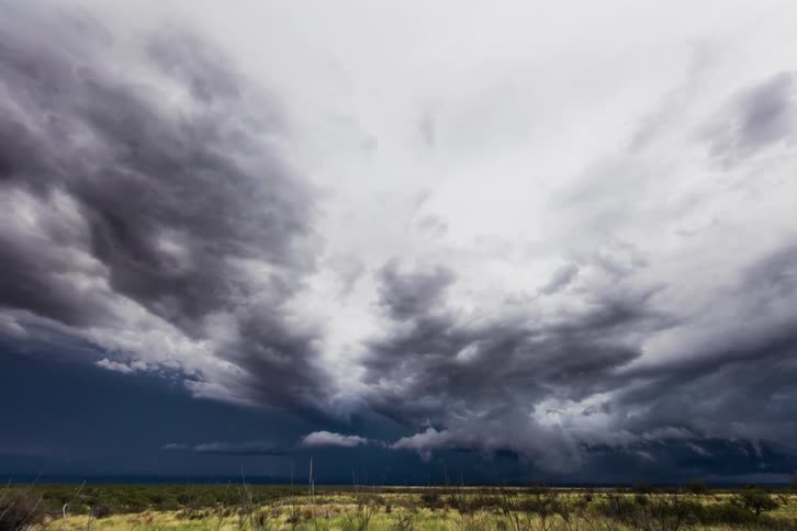 The large clouds move around the sky slowly
