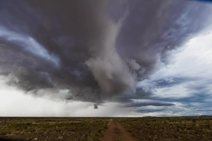 Storm clouds gather over plains