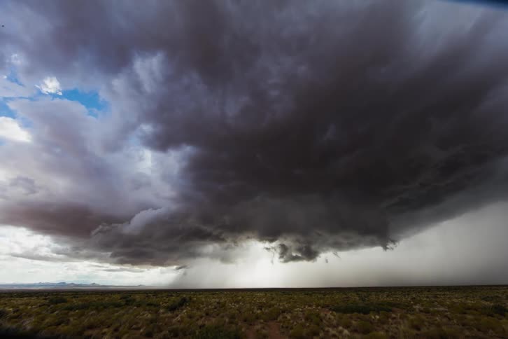 A storm builds over some plains