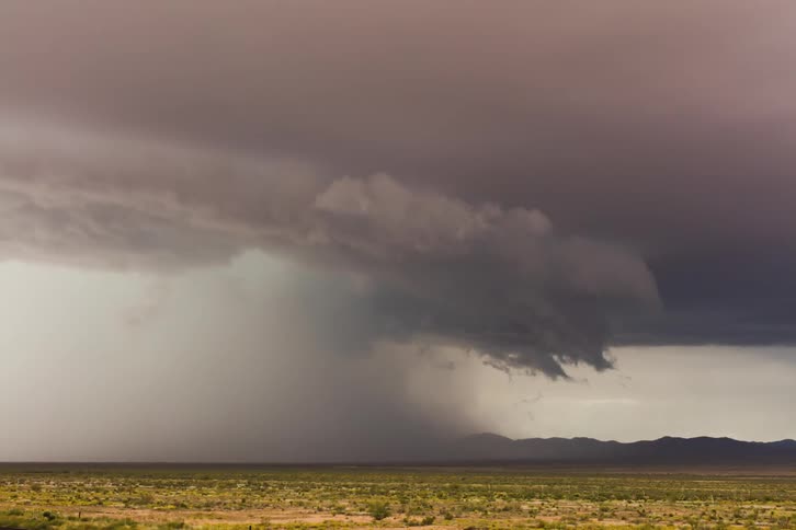 Storm clouds gather and move over the landscape