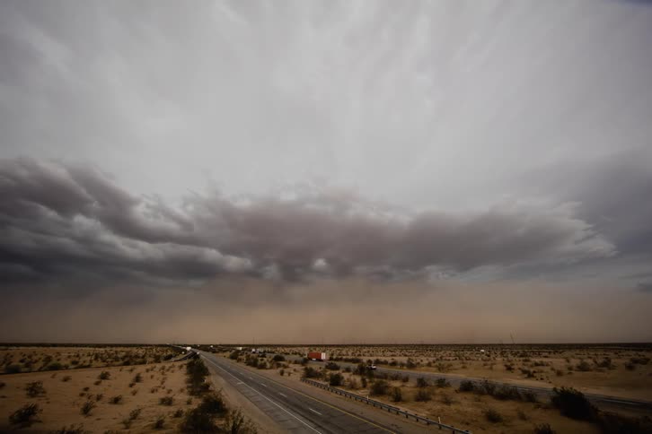 Cars travel back and forth on the highways