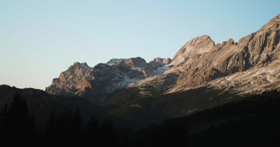 A large, jagged mountain during the day