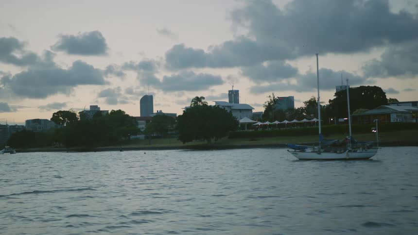 Boat floating down a river