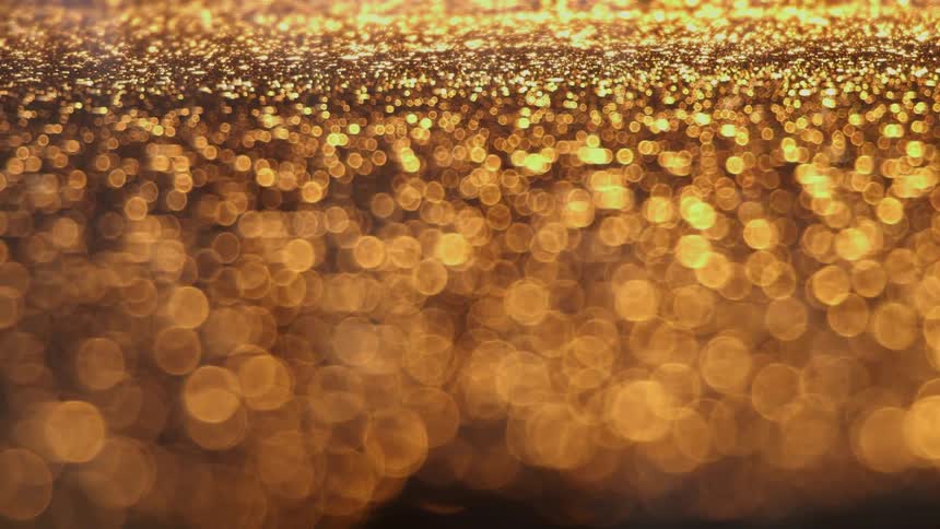 Sparking gold colored ground